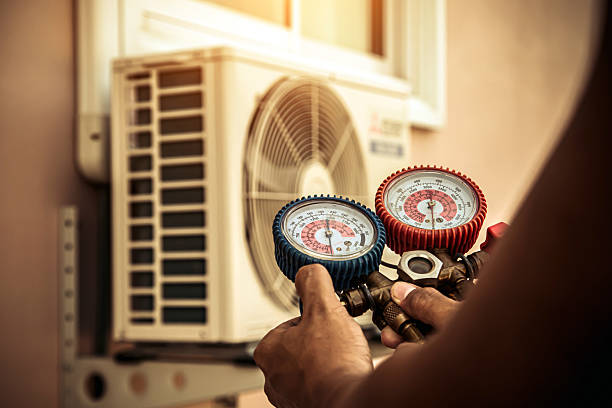 Professional Hvac technician working in Janesville, WI